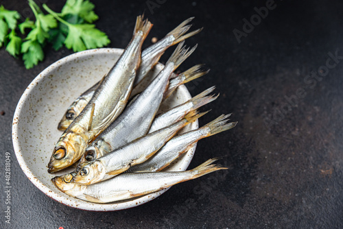 Photos sprat fish herring smoked salted seafood fresh portion dietary healthy meal food