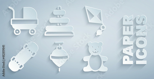 Set Whirligig toy, Kite, Skateboard, Teddy bear plush, Pyramid and Baby stroller icon. Vector