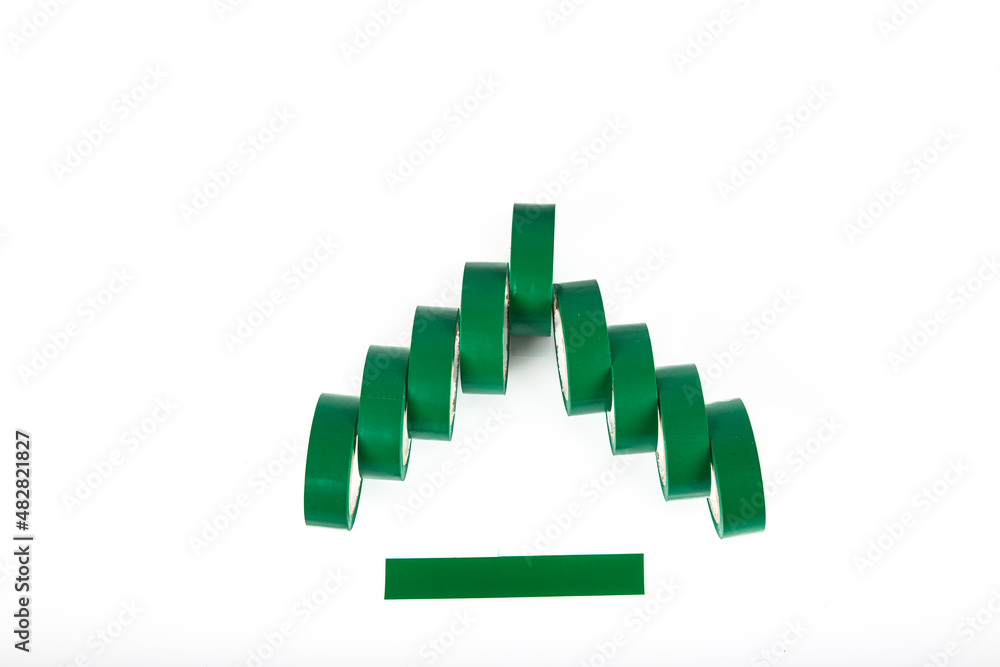 electrical tape (Insulated Electrical Tape) of different colors on a white background, adhesive tape for electricity green on a white background.