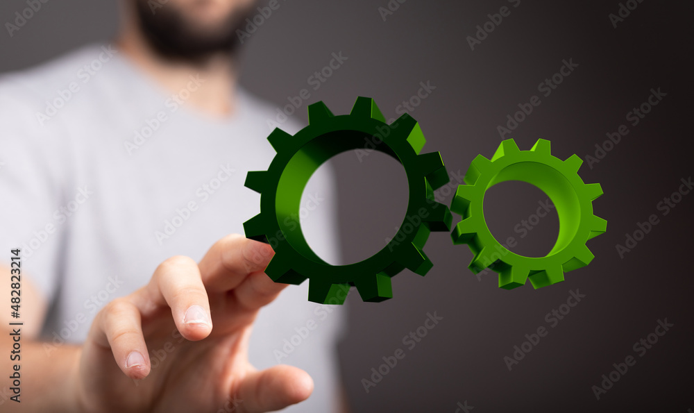 Set of green gears and cogs on black background Set of green gears and cogs on black background