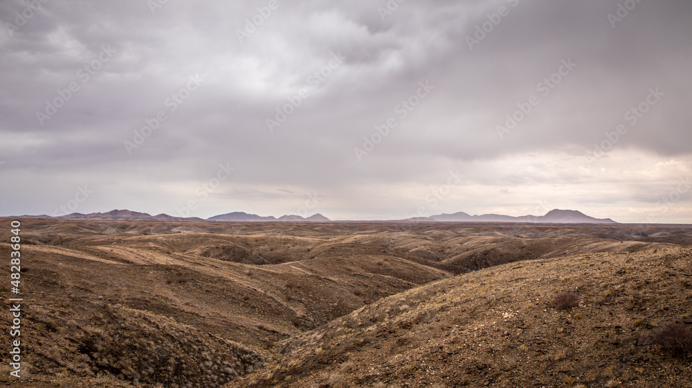 Kuiseb pass with dramatic clouds, Kuiseb Canyon, Namibia.  Horizontal.