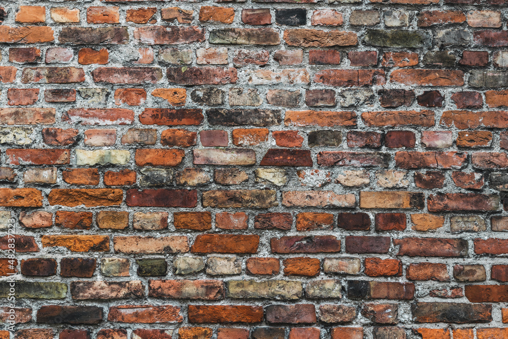 Fototapeta premium Red brick weathered wall background