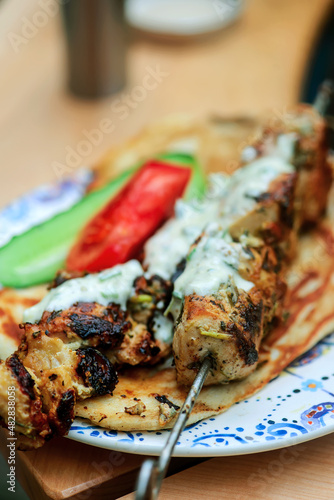 Grilled chicken shish tavuk and naan.selective focus