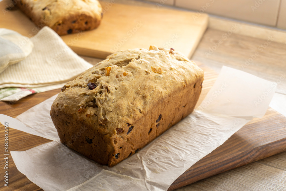 German Christmas Stollen (Vegan Fruit Bread) food concept German Christmas Stollen (Vegan Fruit Bread) food concept