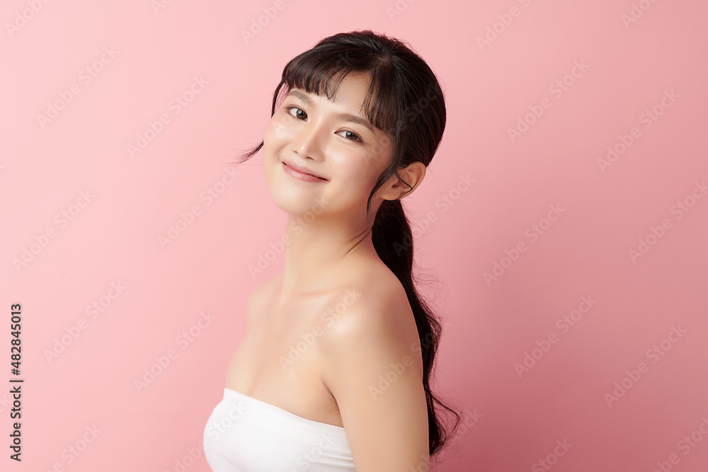 Beautiful young asian woman with clean fresh skin on pink background, Face care, Facial treatment, Cosmetology, beauty and spa, Asian women portrait. Beautiful young asian woman with clean fresh skin on pink background, Face care, Facial treatment, Cosmetology, beauty and spa, Asian women portrait.