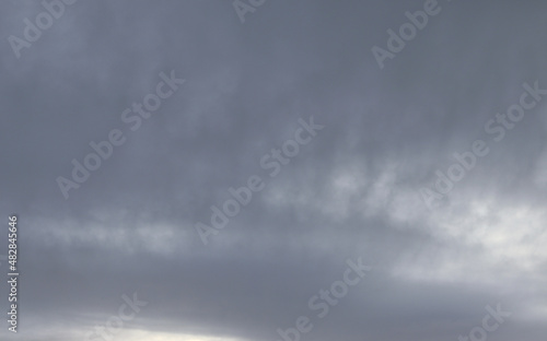 Photo of clouds and fog floating in the air with gray and white alternating Gives it a dull, gloomy, confusing, vague, rain-like feel. Ideas for simple, no-text, empty backgrounds.
