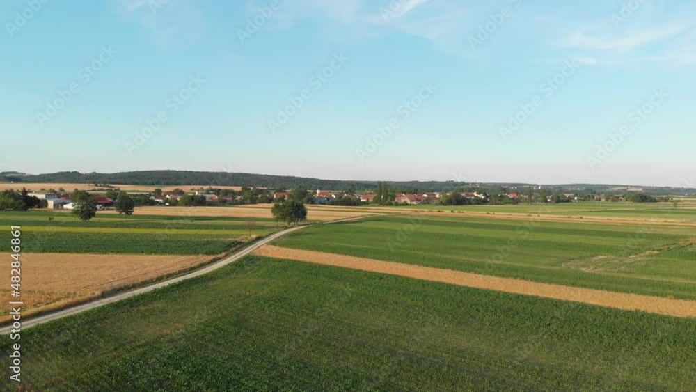 aerial view of charming village in Prekmurje Slovenia lowlands, blue sky summer day aerial view of charming village in Prekmurje Slovenia lowlands, blue sky summer day