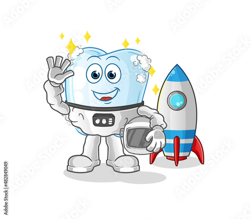 tooth with foam astronaut waving character. cartoon mascot vector