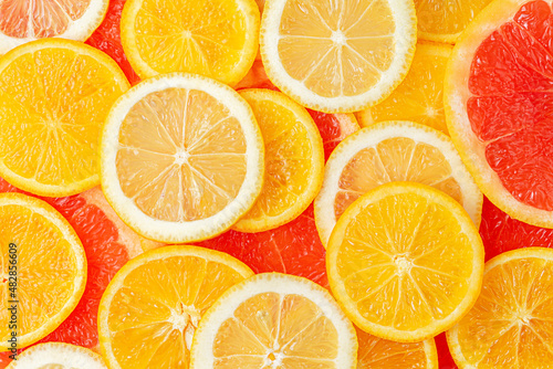 Different citrus fruits pattern. Summer background. Flat lay