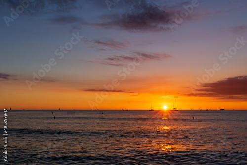 waikiki hawaii sunset over the sea