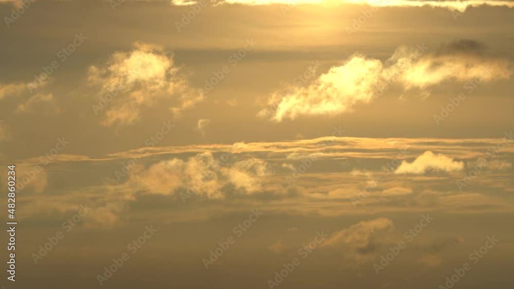 Sunset clouds. Golden Hour Clouds Moving in the Sky over Mountain Area in palatine Forest and Hills in evening Orange Glow Sunset clouds. Golden Hour Clouds Moving in the Sky over Mountain Area in palatine Forest and Hills in evening Orange Glow
