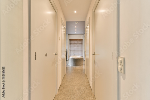 Wallpaper Mural Corridor leading to bathroom with bed Torontodigital.ca