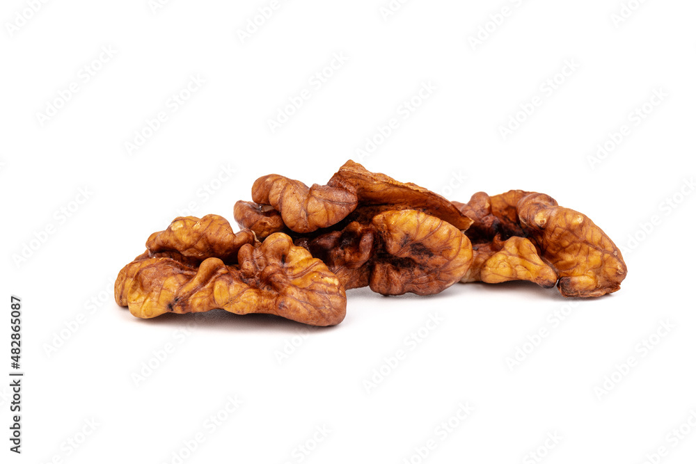 Walnut kernels isolated on white background. Space for text. Walnut kernels isolated on white background. Space for text.