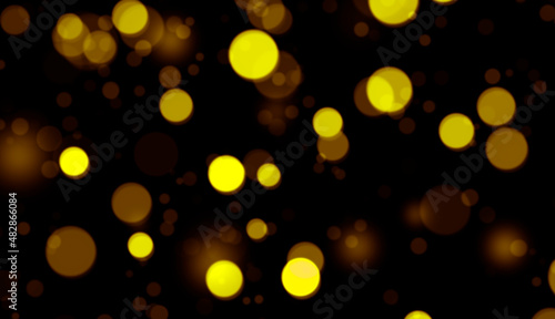 Golden Defocused Lights on black Abstract Background