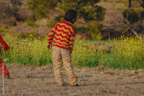 child walking in the field
