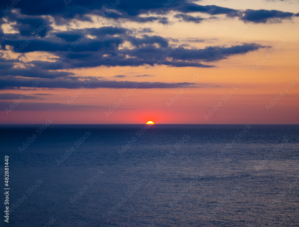 Sunset on the sea in Cornwall, United Kingdom Sunset on the sea in Cornwall, United Kingdom