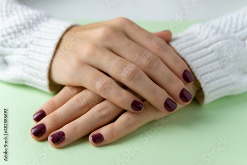 Relaxed hands with freshly manicured nails