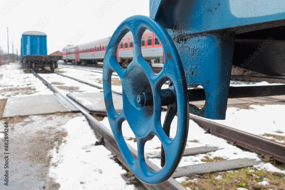 Blue wheel of an industrial wagon Blue wheel of an industrial wagon