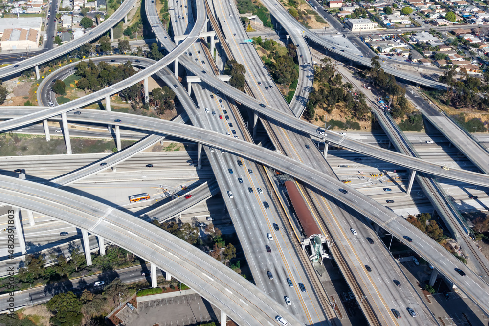 Century Harbor Freeway intersection junction Highway roads traffic America city aerial view photo in Los Angeles