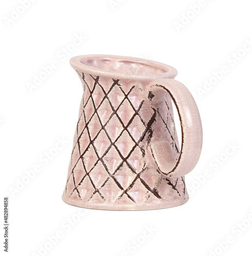 Empty pink ceramic jug with...
