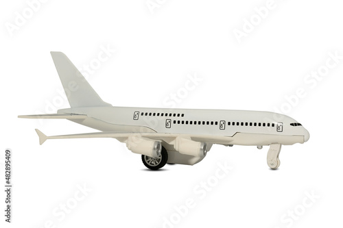 The figure of a white plane on a white background. Travel concept.