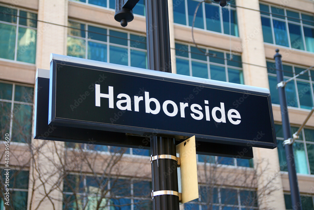 Obraz premium Harborside black and white sign on the station on the light rail path