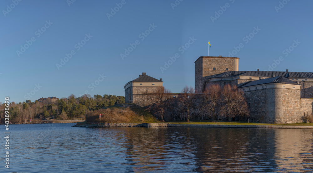 Northern part of the 1700s defense line fortress Vaxholms kastell and the redoubt on the island Rindö a sunny winter day in the archipelago of Stockholm