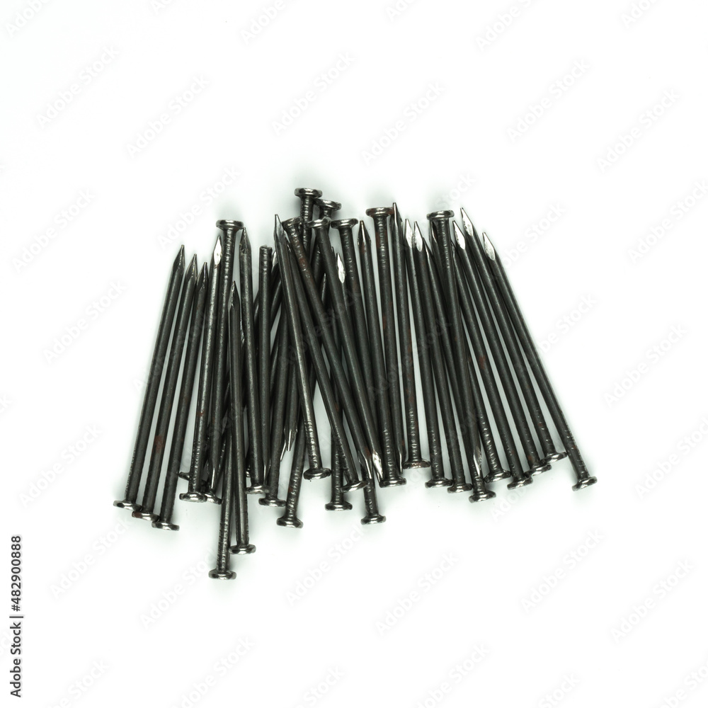 The pile iron nail on white background, Construction, DIY at home, Space for text. The pile iron nail on white background, Construction, DIY at home, Space for text.