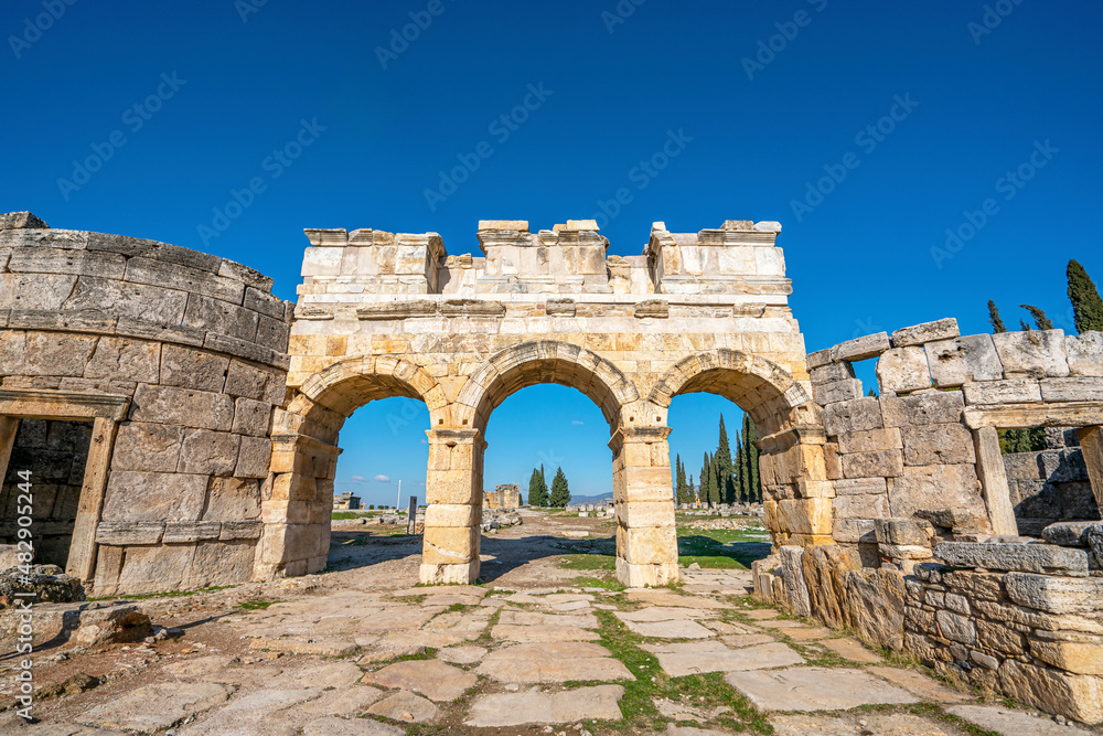 Scenic view of Hierapolis, was an ancient Greek city on hot springs in classical Phrygia,its ruins are adjacent to modern Pamukkale in Turkey and currently comprise an archaeological museum. Scenic view of Hierapolis, was an ancient Greek city on hot springs in classical Phrygia,its ruins are adjacent to modern Pamukkale in Turkey and currently comprise an archaeological museum.