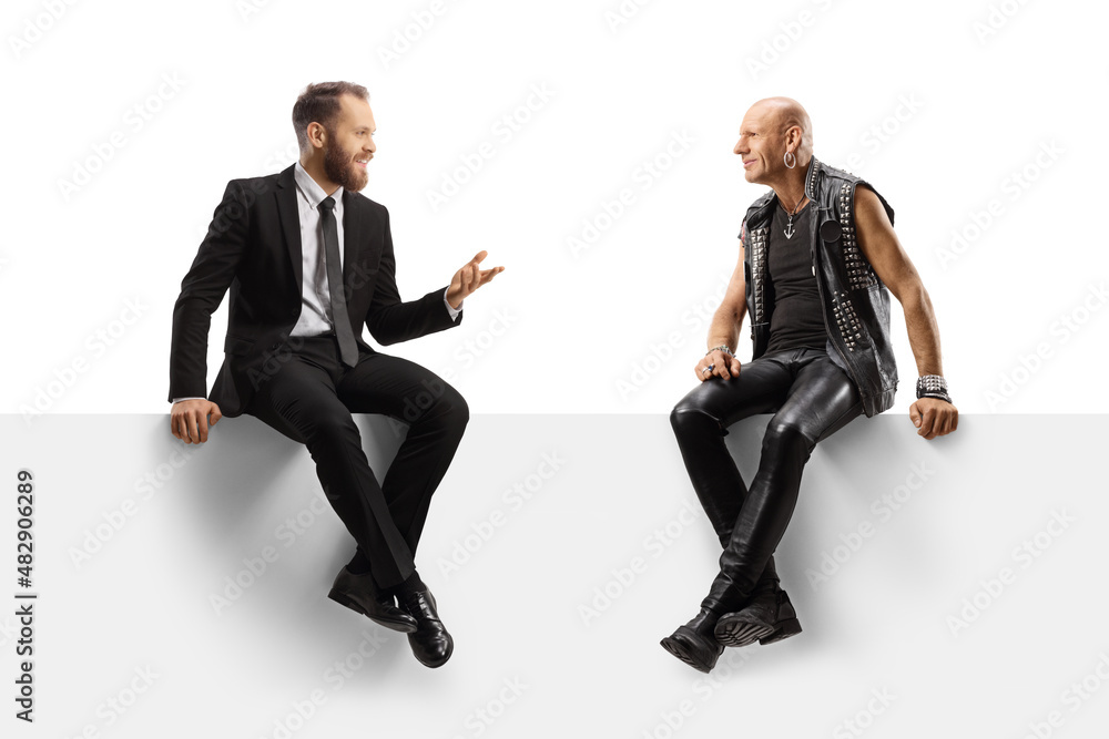 Punk sitting on a panel and listening to a businessman talking