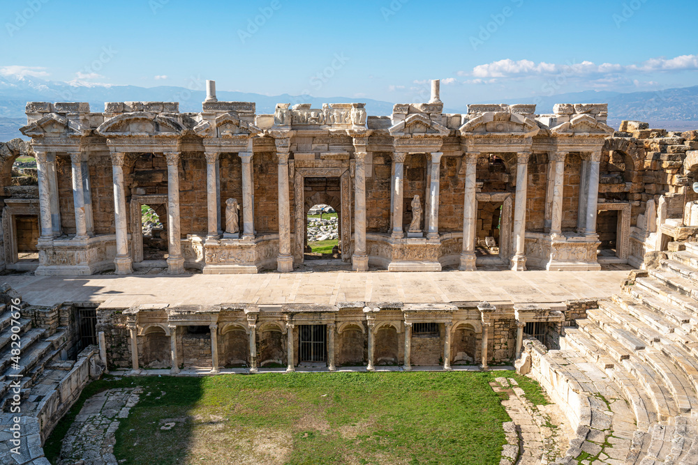 Naklejka premium The roman theater is located in the middle of Hierapolis and is very well preserved. it was built during the reign of Emperor Hadrian in 2nd century AD. and had a capacity of 8500–10000 spectators.