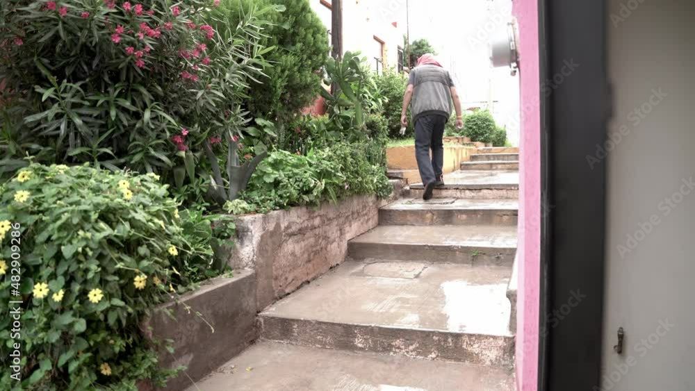 Person walking upstairs while raining Person walking upstairs while raining