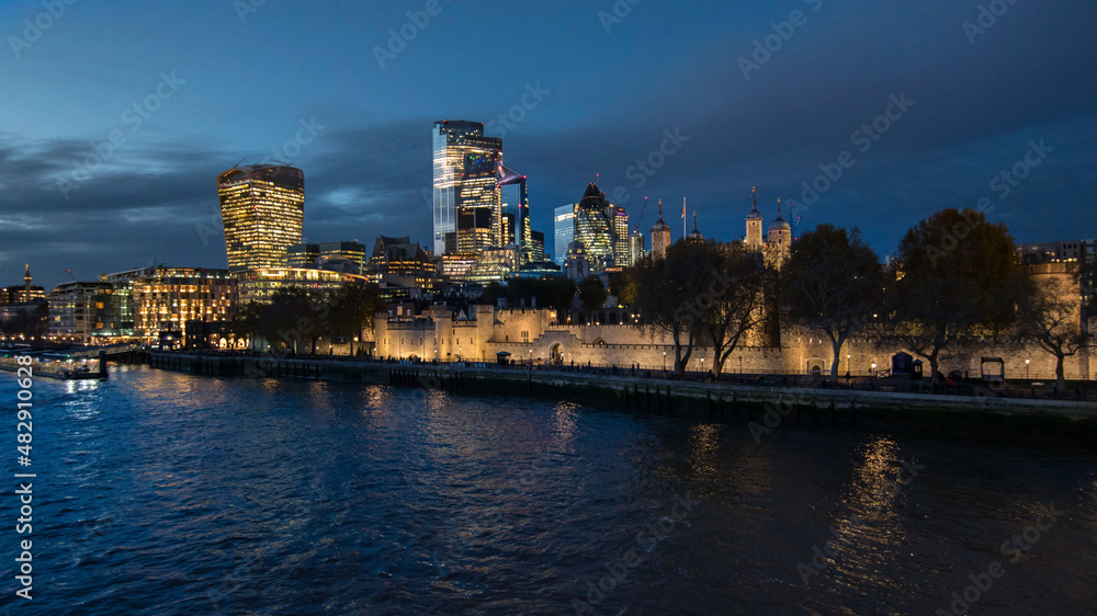 A beautiful sunset over the Tower of London and the skyscrapers of the City