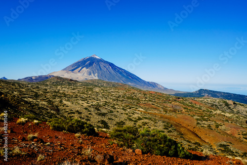 impressive view of the Teide volcano with the snowy peak in the bright morning.