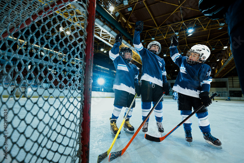 Teenage hockey players in uniforms