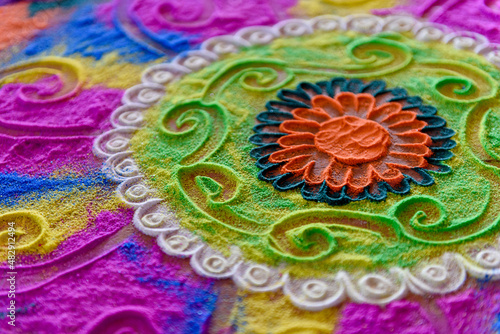 Schilderij op canvas hindu traditional hand drawn colorful Rangoli pattern on the floor