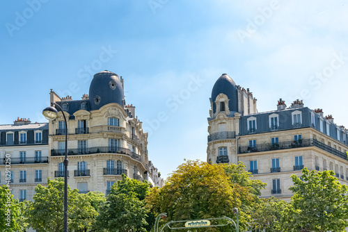 Fototapeta Naklejka Na Ścianę i Meble -  Paris, beautiful buildings, place de la Nation in the 11e arrondissement, in summer
