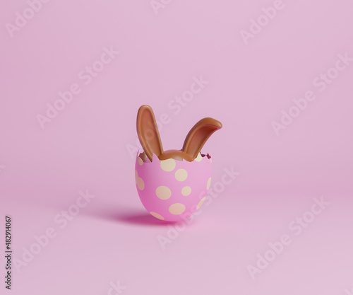 broken easter egg with chocolate bunny ears peeking out