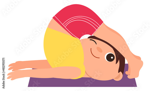 Kid in yoga pose. Boy doing exercise. Healthy child