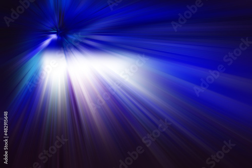 Radial white  blue rays on a dark  abstract background.