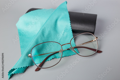  eyeglassses with napkin and case. Keep reading glasses in safe.