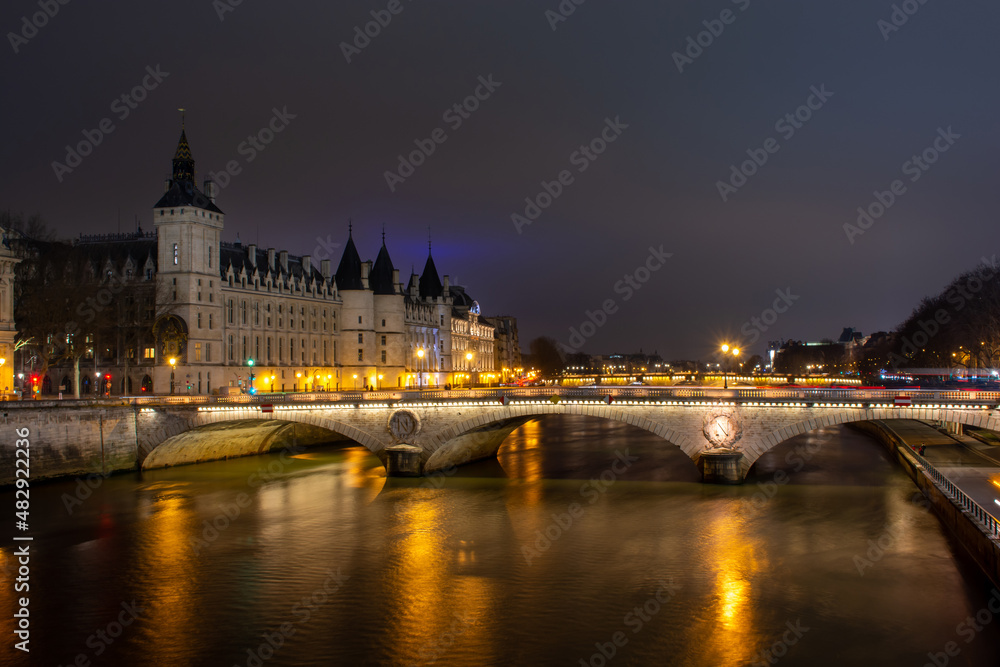 Night Paris, Pont au Change, reflection of lights in the river Seine, cityscape Night Paris, Pont au Change, reflection of lights in the river Seine, cityscape