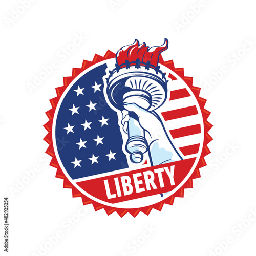 Round label with a hand holding a torch of the flame of liberty on the background of the American flag