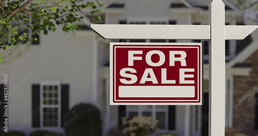 4k Pan and Zoom of For Sale Real Estate Sign in Front of New House. 4k Pan and Zoom of For Sale Real Estate Sign in Front of New House.