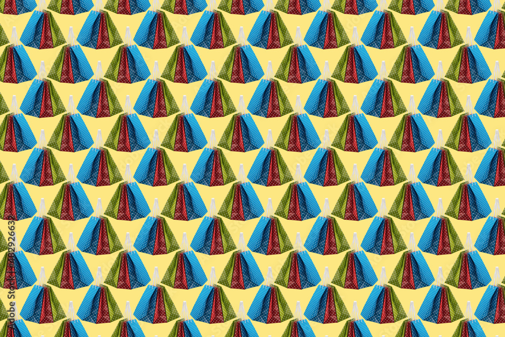Abstract background composed of colored paper gift bags Abstract background composed of colored paper gift bags