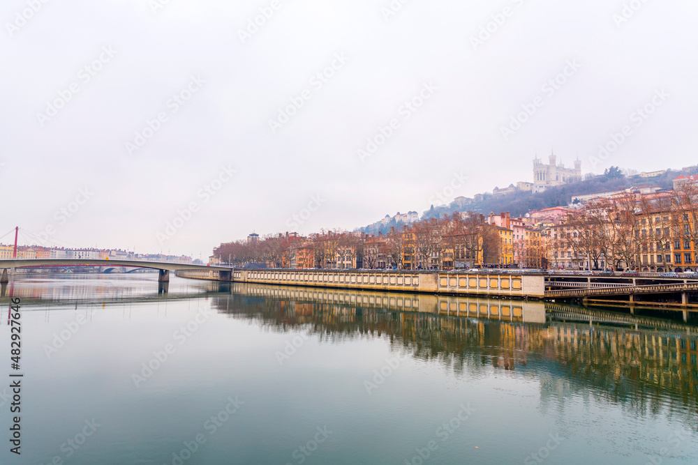 Fototapeta premium Winter scene with buildings around the River Saone, Lyon, France