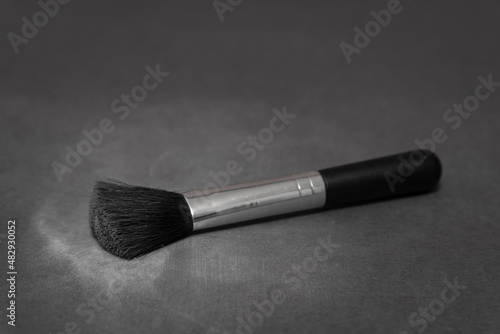 brush makeup on black backround