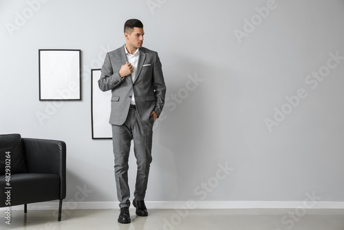 Handsome man in elegant sui...