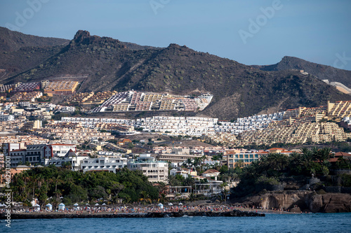 Fototapeta Naklejka Na Ścianę i Meble -  View on resorts and beaches of South coast of Tenerife island during sail boat trip along coastline, Canary islands, Spain