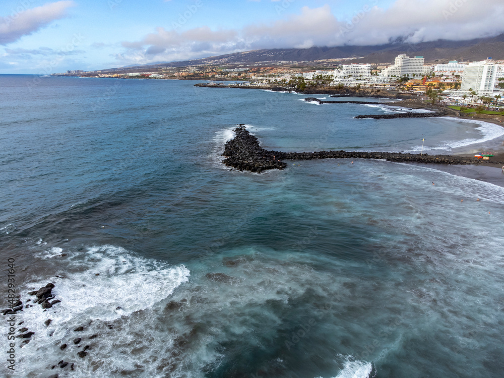Aerial view on costline with sandy beaches on South of Tenerife near Costa Adeje and Playa de las Americas, Canary islands, Spain